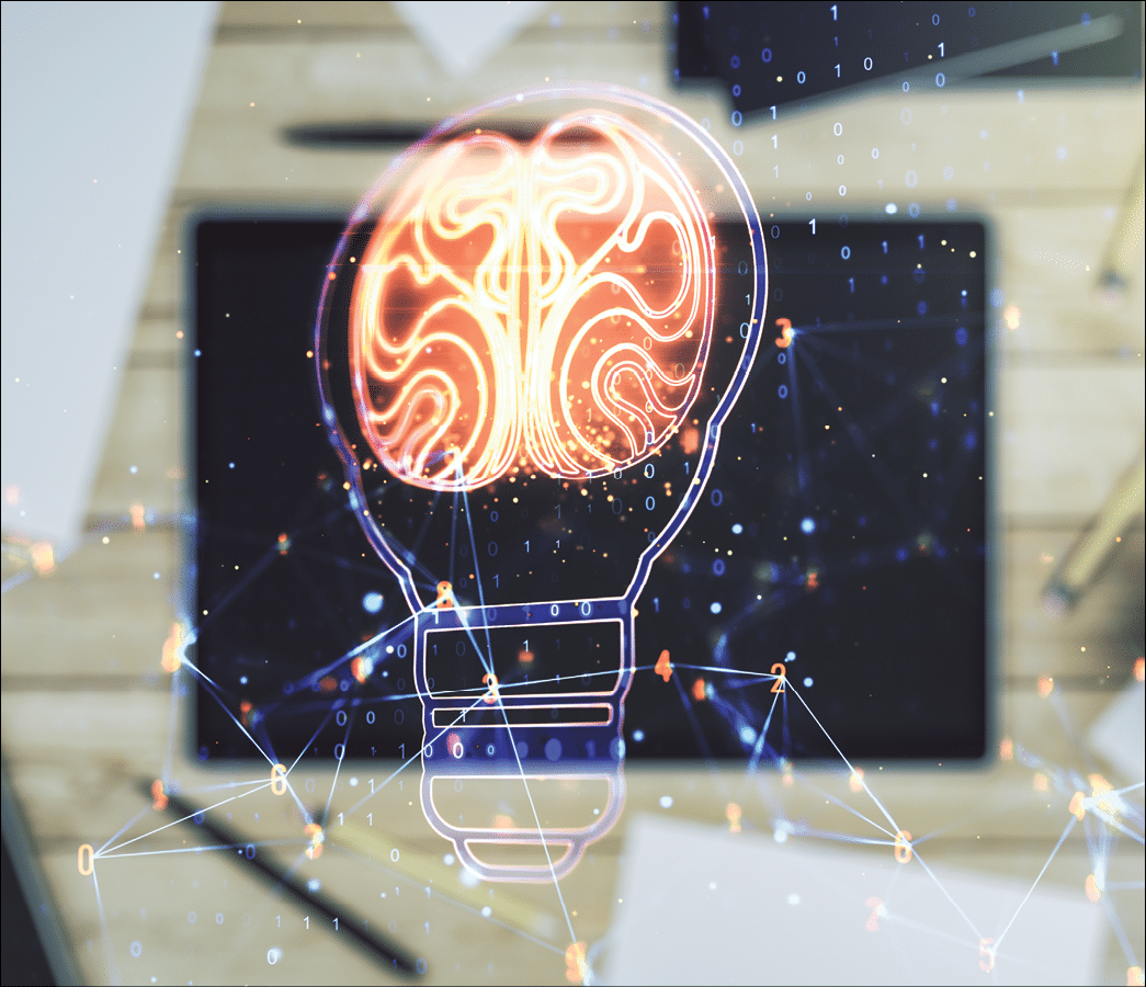 Double exposure of creative light bulb hologram with human brain and digital tablet on background, top view, idea and brainstorming concept