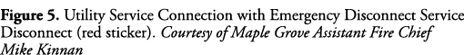 Figure 5  Utility Service Connection with Emergency Disconnect Service Disconnect (red sticker)  Courtesy of Maple Gr   