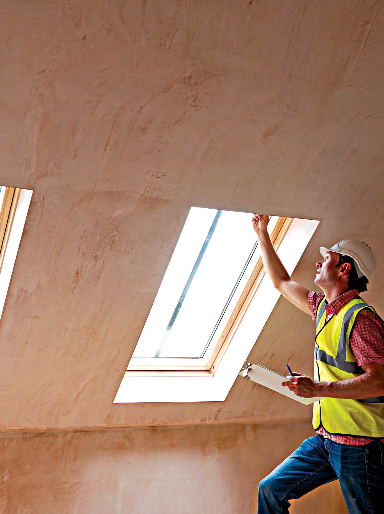 Building Inspector Looking At New Property