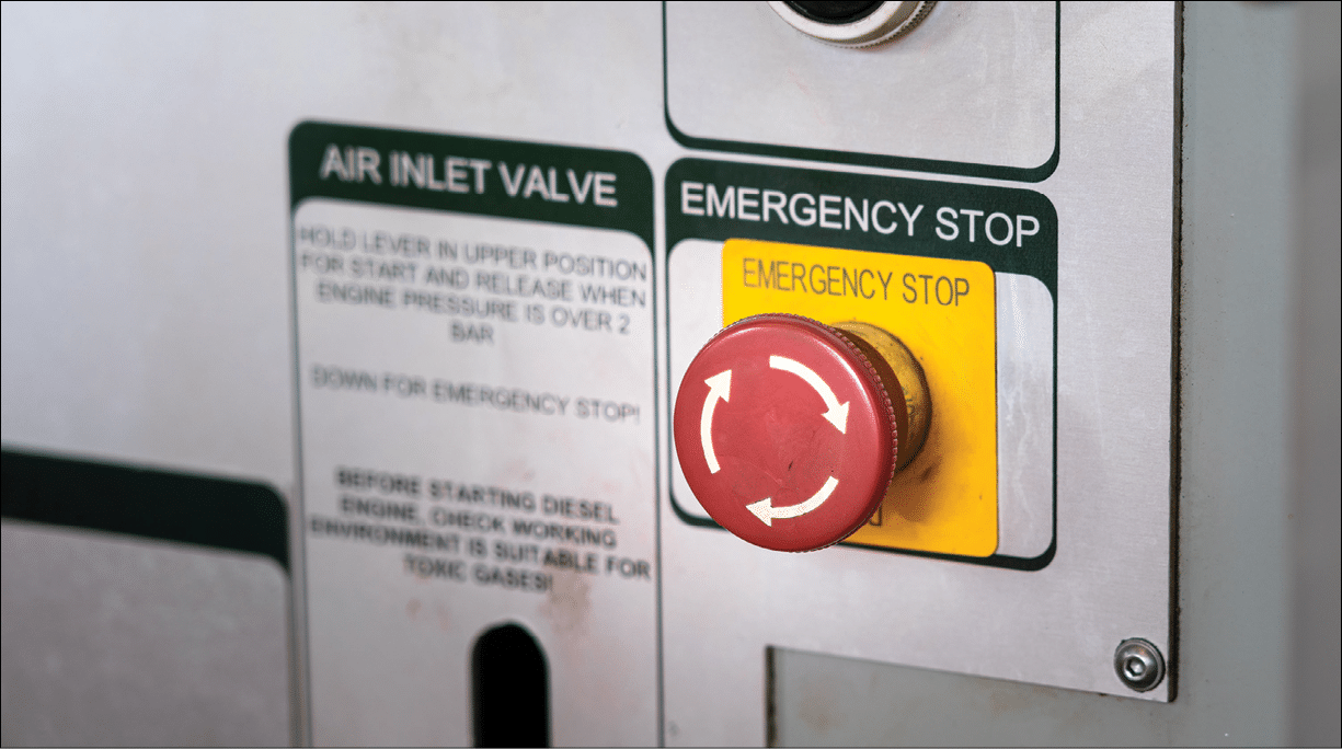 An emergency stop (ESD) red button on the power pack engine equipment  It use for stop the engine suddenly in case of emergency  Industrial object photo 