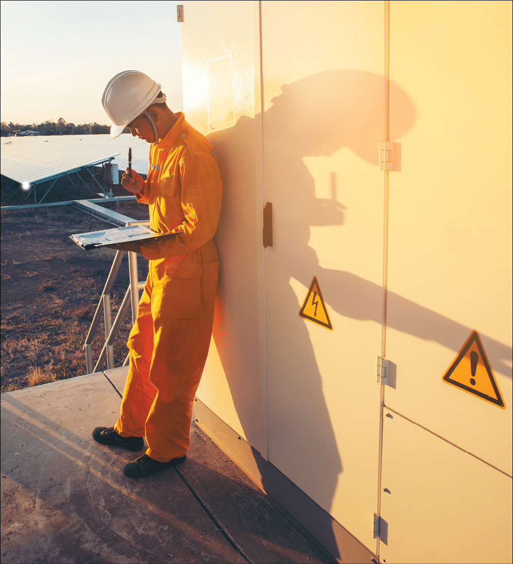 Male Electricity Engineer inspect and maintenance electric power system in generator at solar plant  Technician checklist work and service on switchgear at substation control 