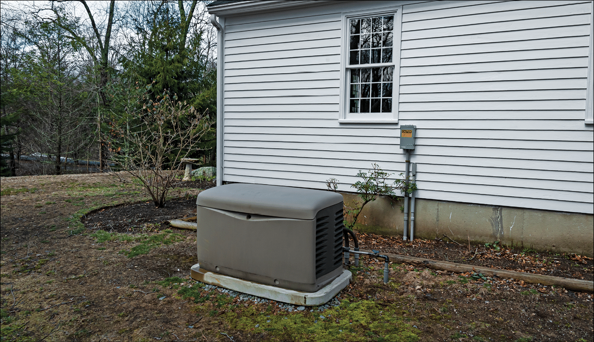 Residential standby generator on a concrete pad