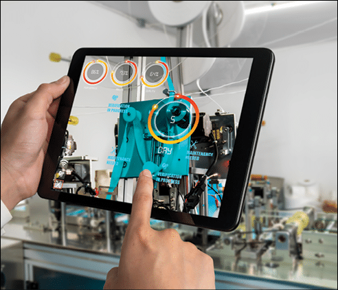 Engineer use augmented reality software in smart factory production line with automated application   Futuristic machinery in working in concept of Industry 4 0 or 4th industrial revolution 