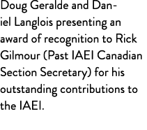 Doug Geralde and Daniel Langlois presenting an award of recognition to Rick Gilmour (Past IAEI Canadian Section Secre...