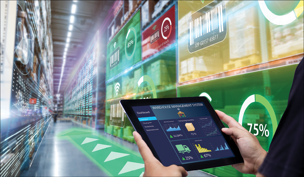 Worker hands holding tablet on blurred warehouse as background