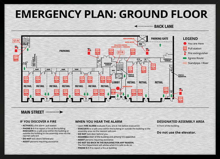 Brushed metal. Map of residential or strata building with retail stores and parking on ground floor. Detailed text instruction for residents in case of an emergency.