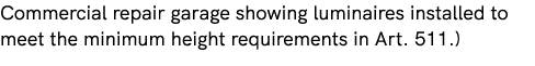 Commercial repair garage showing luminaires installed to meet the minimum height requirements in Art. 511.) 