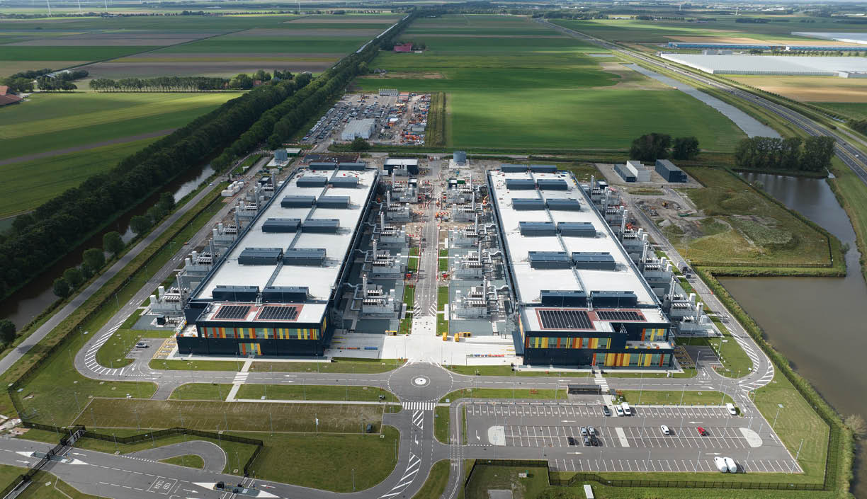 Data center, cloud storage infrastructure, big data housing in The Netherlands. Aerial drone view.